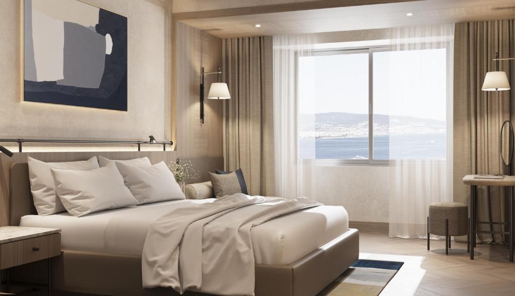 Postel nebo postele na pokoji v ubytování Kolin Hotel Spa & Convention Center