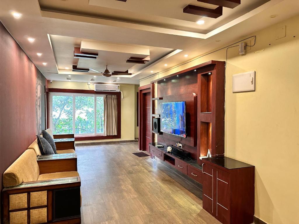 TV a/nebo společenská místnost v ubytování Vensa corporate Inn