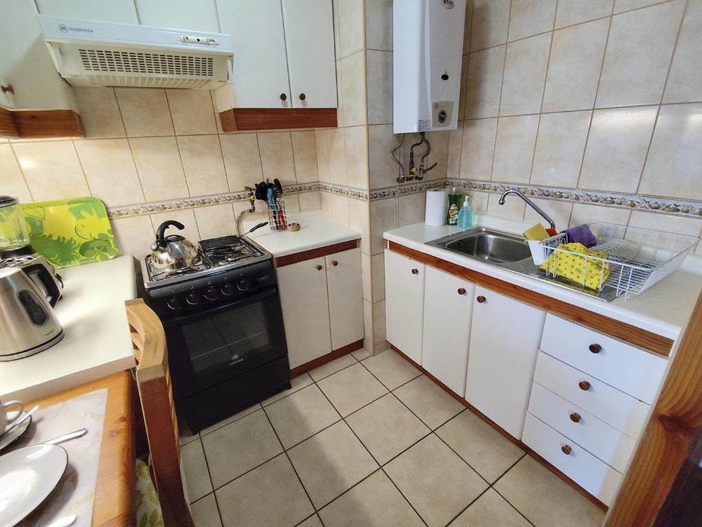 Kuchyň nebo kuchyňský kout v ubytování Departamento Los Refugios