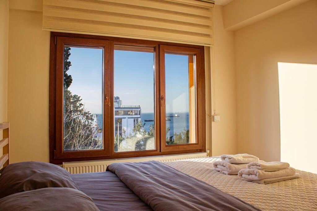 Postel nebo postele na pokoji v ubytování Stylish Triplex Apartment in The Heart of Izmir