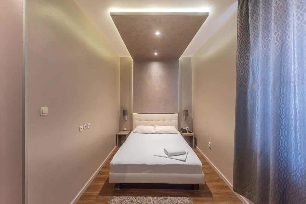 Letto o letti in una camera di Garni Hotel Mediteraneo