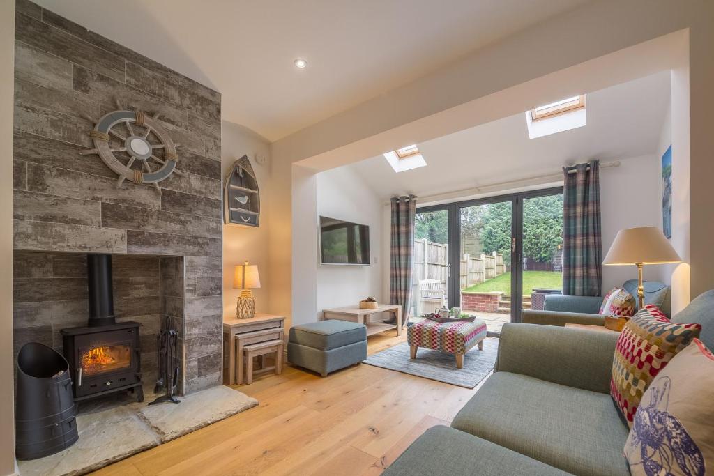 Posezení v ubytování Blossom Cottage 4