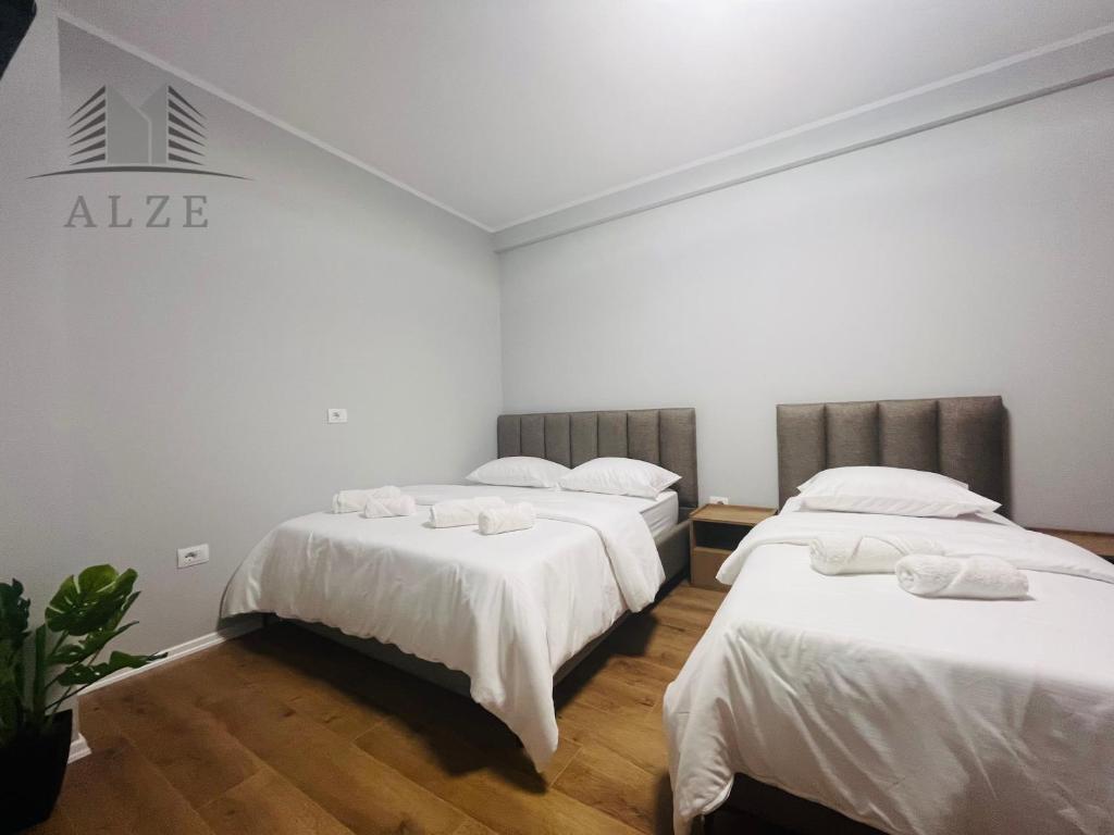 Voodi või voodid majutusasutuse Alze Hotel - Tirana toas