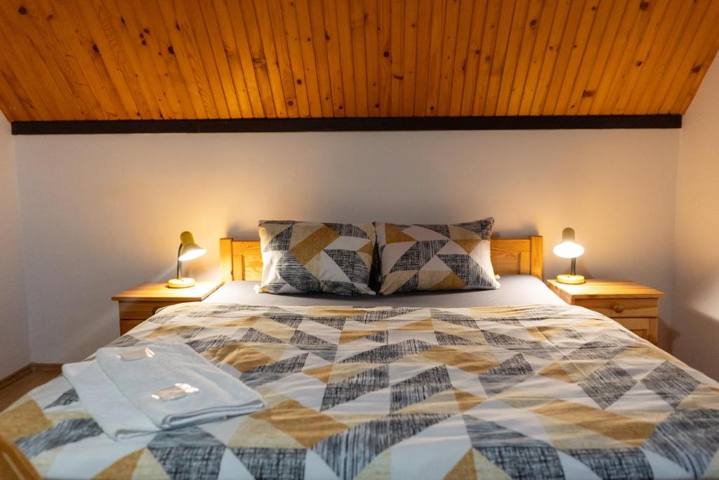 Postel nebo postele na pokoji v ubytování Penzion Jas