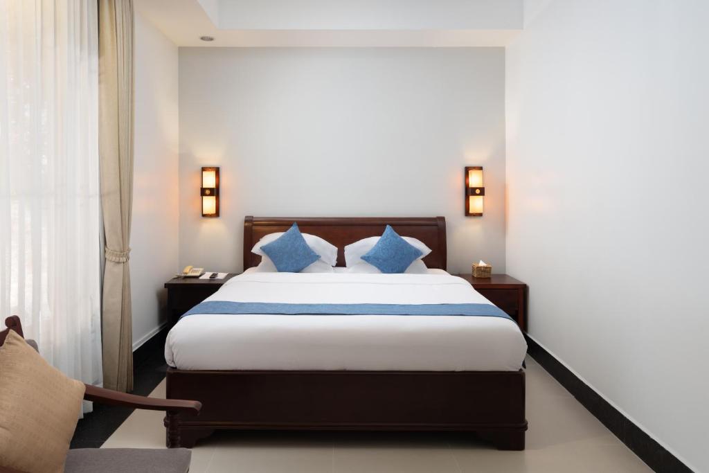 Postel nebo postele na pokoji v ubytování Skyline Boutique Hotel