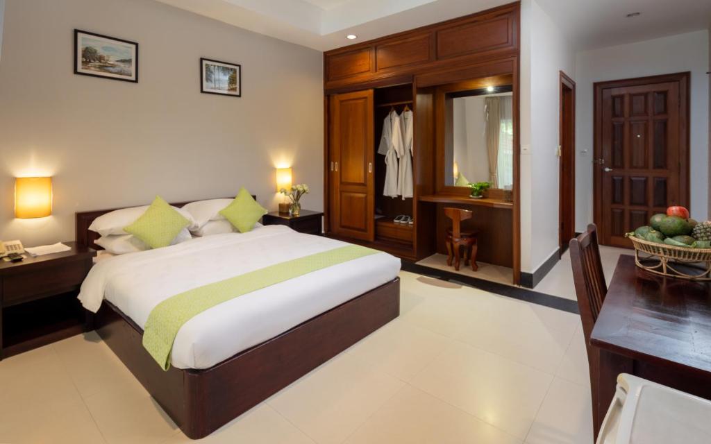 Postel nebo postele na pokoji v ubytování Skyline Boutique Hotel