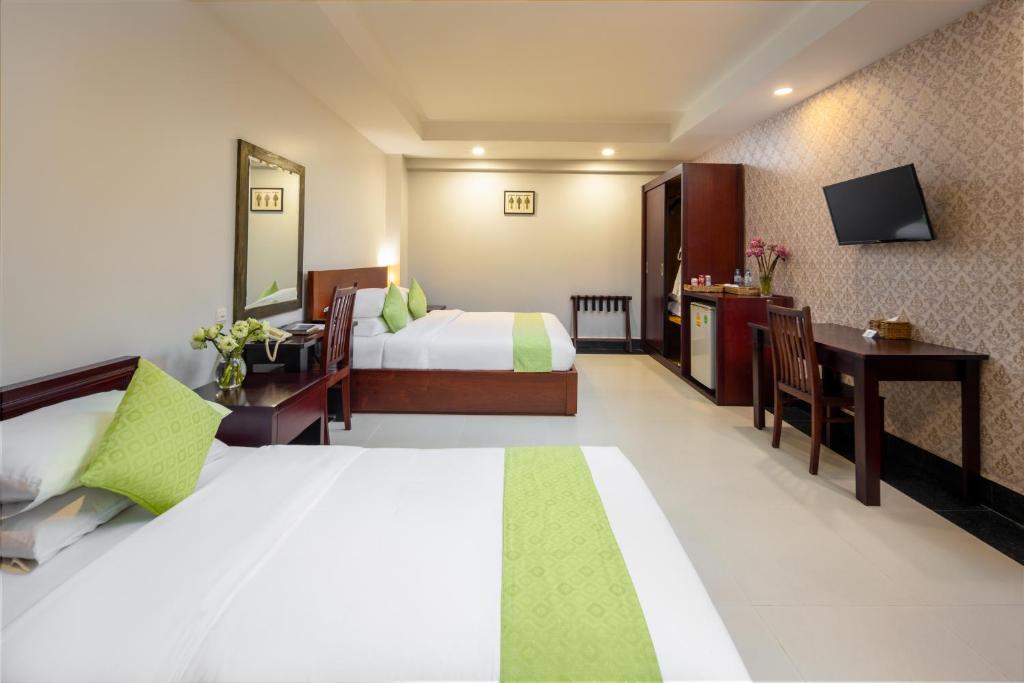 Postel nebo postele na pokoji v ubytování Skyline Boutique Hotel