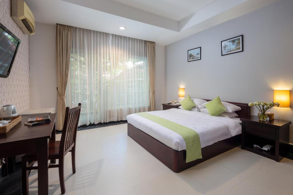 Postel nebo postele na pokoji v ubytování Skyline Boutique Hotel