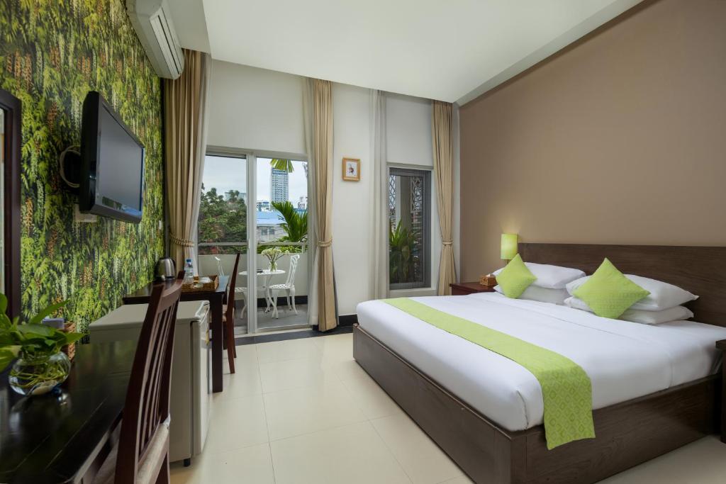 Postel nebo postele na pokoji v ubytování Skyline Boutique Hotel