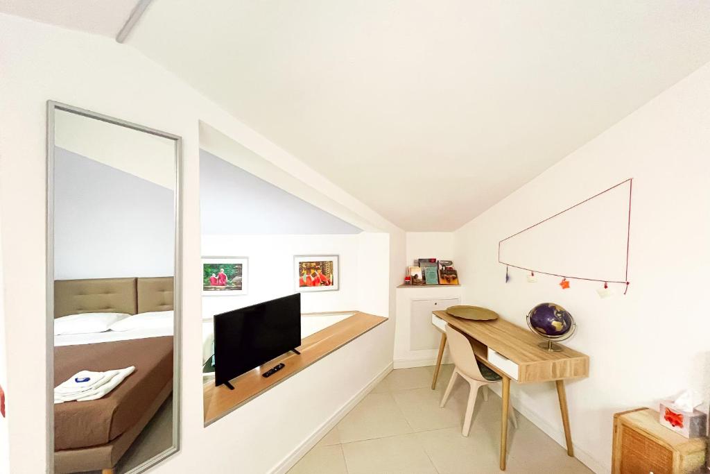 Televízia a/alebo spoločenská miestnosť v ubytovaní Stella House B&B + Free park