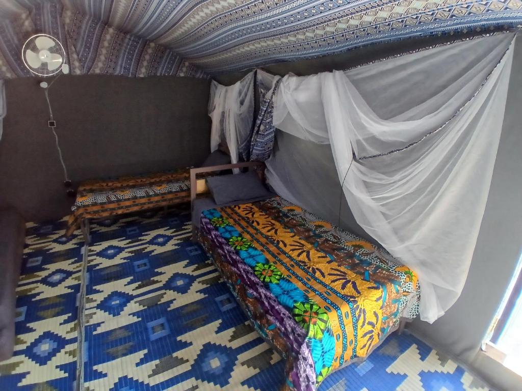 a bedroom with a bed and a canopy at 
