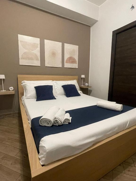 Postel nebo postele na pokoji v ubytování Policlinico Room