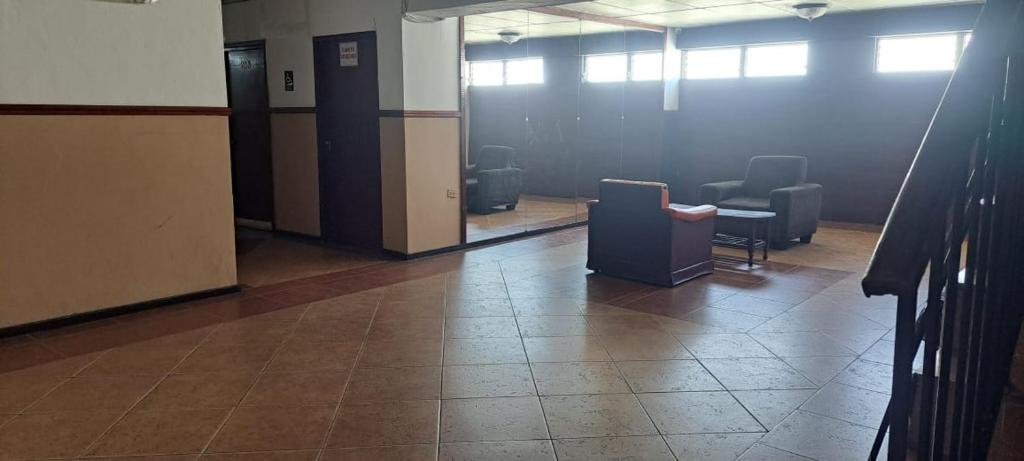 Posezení v ubytování NUEVA ADM- Hotel Occidental