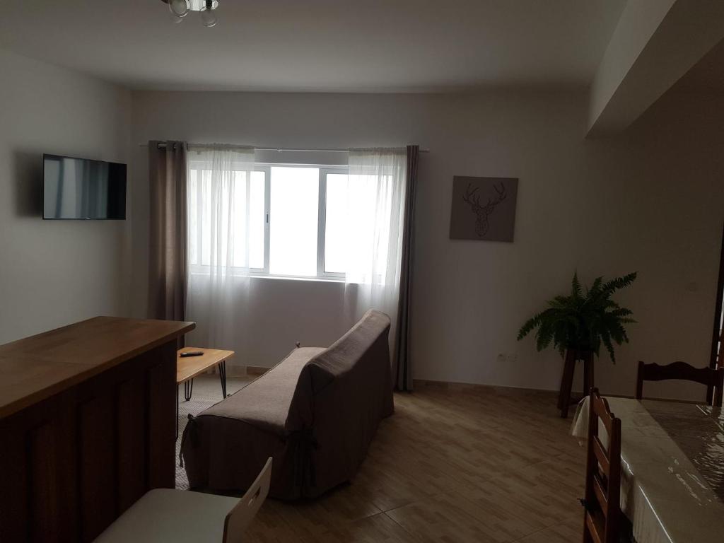 TV a/nebo společenská místnost v ubytování Residencia Solimar