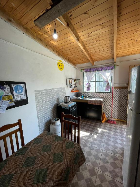 Postel nebo postele na pokoji v ubytování Alojamiento Lunas en Chuy con Baño Privado