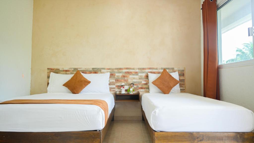 Postel nebo postele na pokoji v ubytování Hotel del Parque