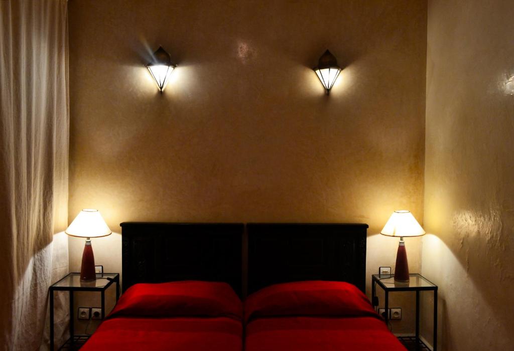 Postel nebo postele na pokoji v ubytování Riad Charik