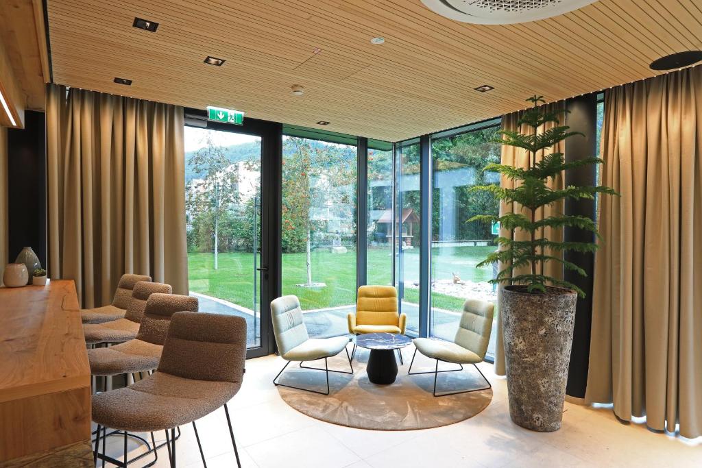 Posezení v ubytování Hotel Steiermarkhof Graz - Aus Holz gebaut, von Hügeln geküsst