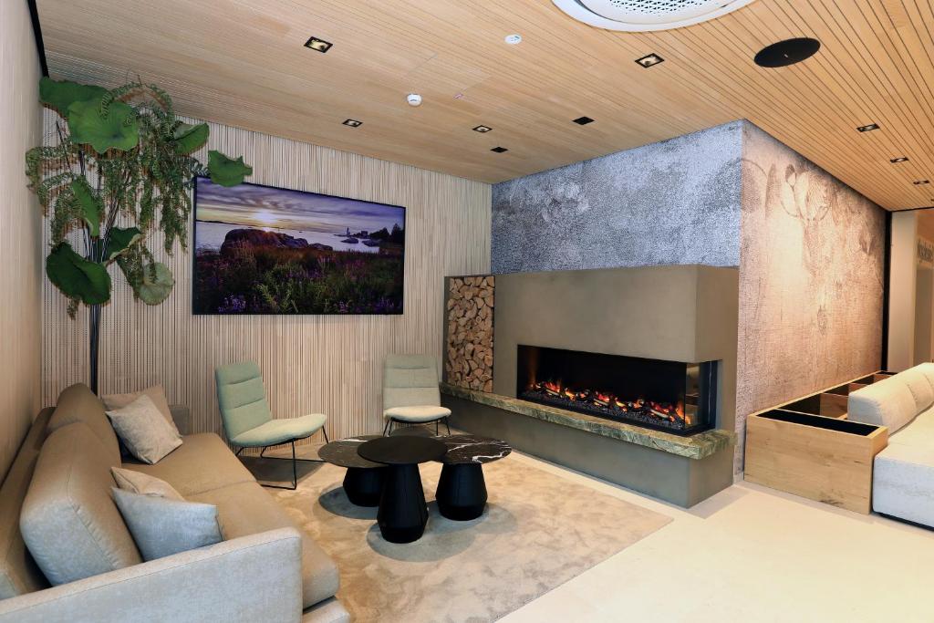 Posezení v ubytování Hotel Steiermarkhof Graz - Aus Holz gebaut, von Hügeln geküsst