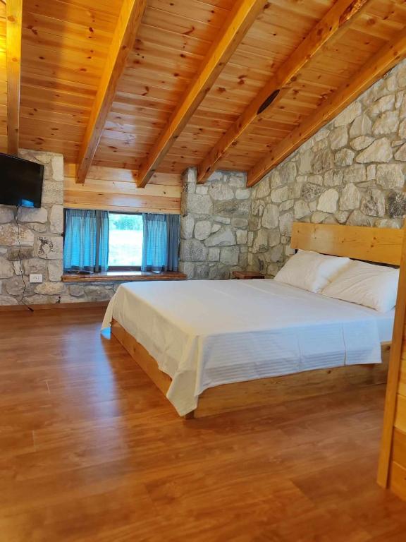 Postel nebo postele na pokoji v ubytování Vila Nikol