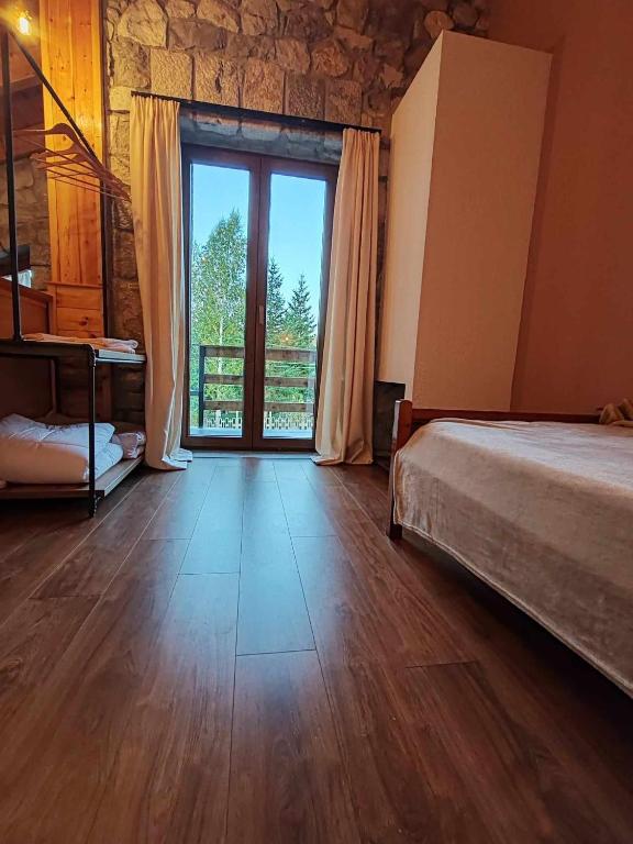 Postel nebo postele na pokoji v ubytování Vila Nikol