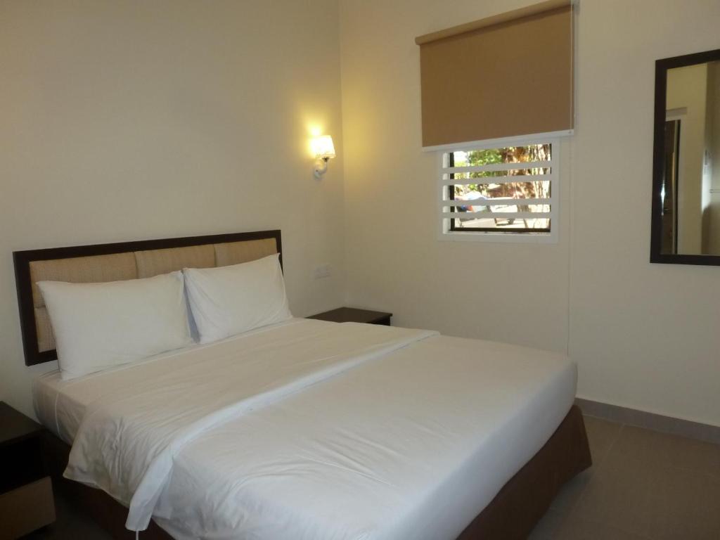 Postel nebo postele na pokoji v ubytování Hotel Hong