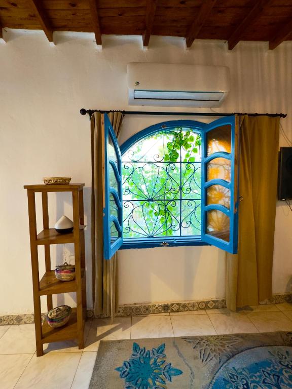 Postel nebo postele na pokoji v ubytování Blue Villa in Lighthouse