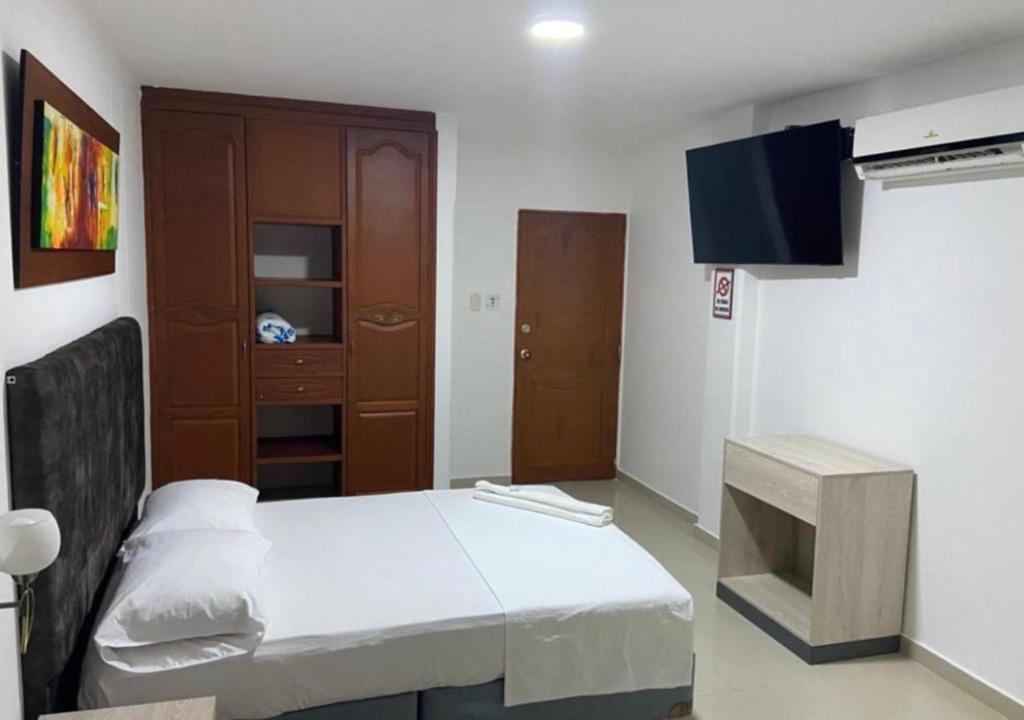 TV a/nebo společenská místnost v ubytování Hotel Vans Valledupar