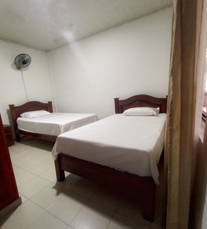 Postel nebo postele na pokoji v ubytování Hotel Unión
