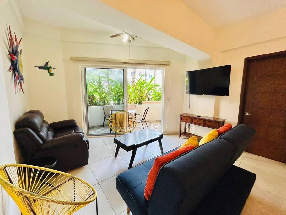 TV a/nebo společenská místnost v ubytování Departamento frente al mar en zona cerritos