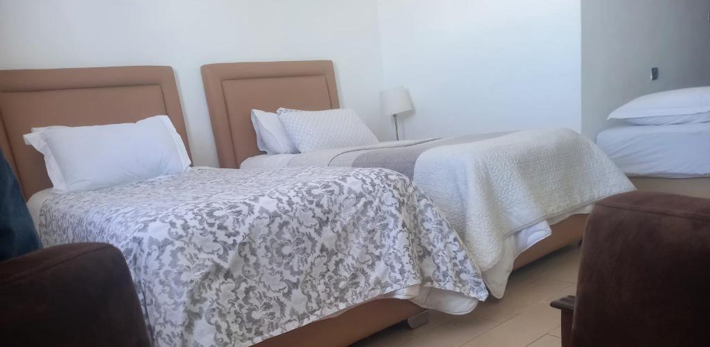 Postel nebo postele na pokoji v ubytování Hotel Salime Al Khozama