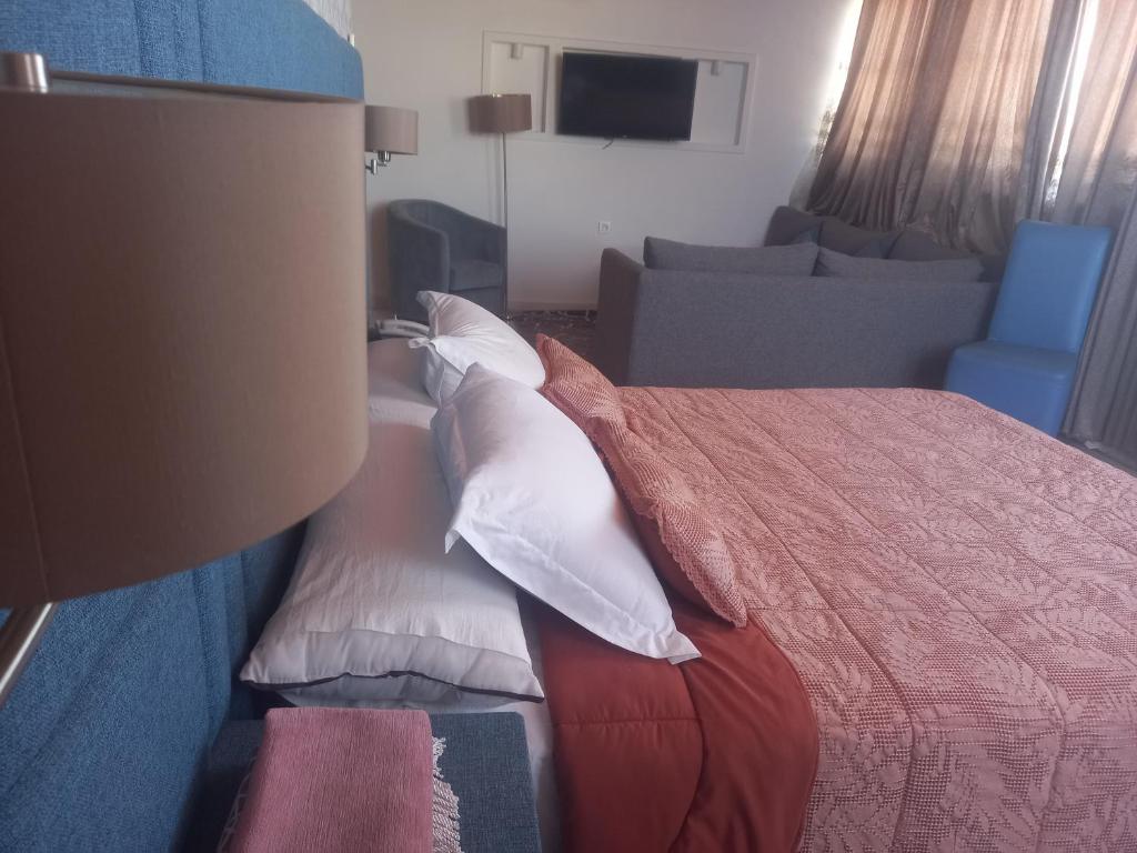 Postel nebo postele na pokoji v ubytování Hotel Salime Al Khozama