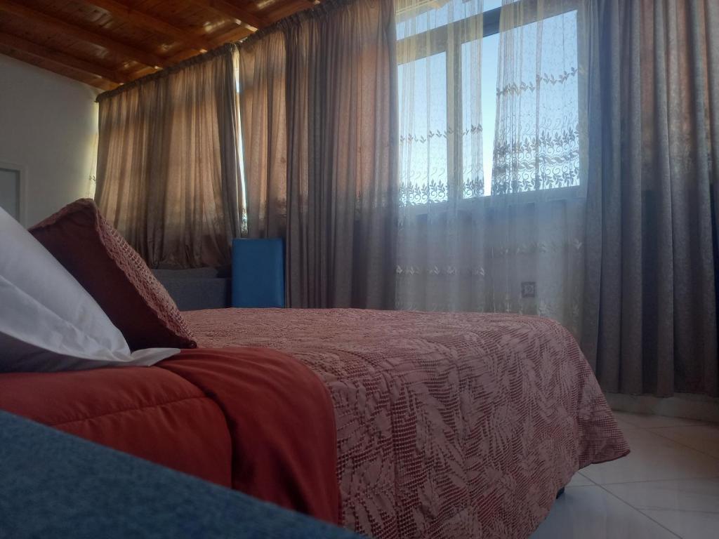 Postel nebo postele na pokoji v ubytování Hotel Salime Al Khozama