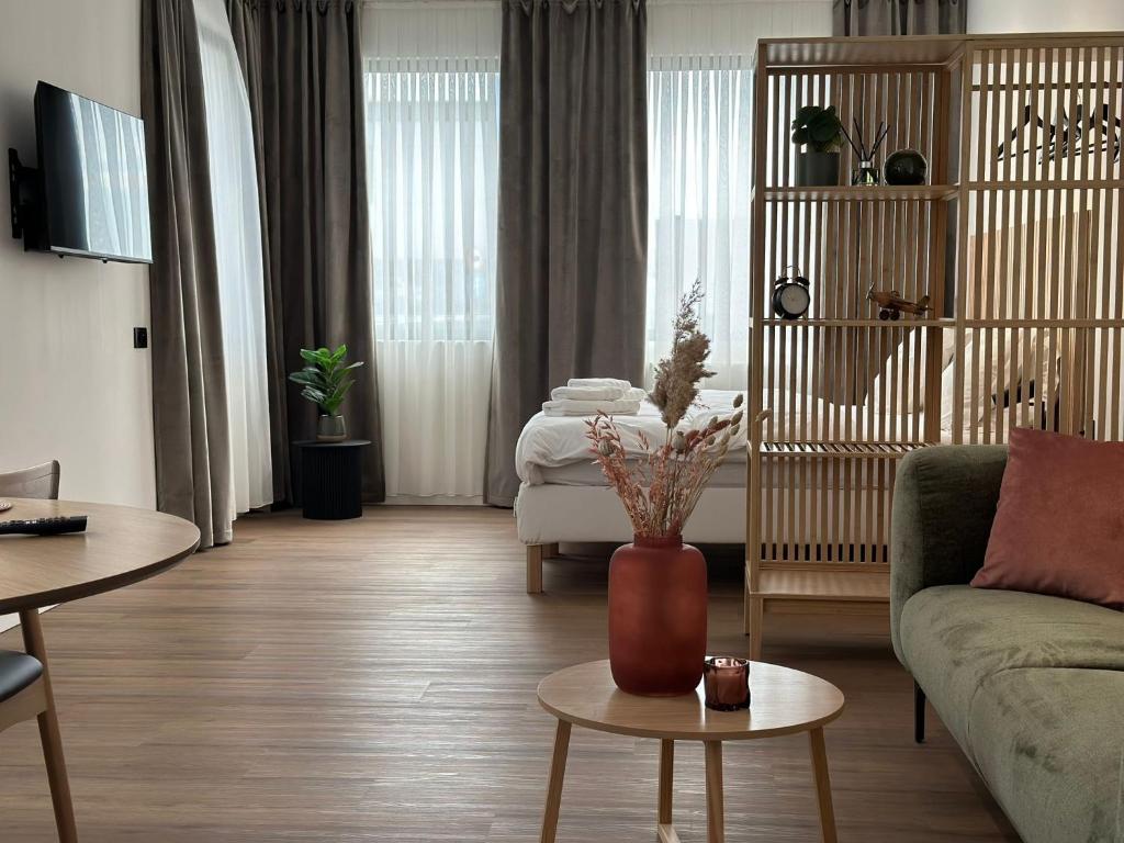 TV a/nebo společenská místnost v ubytování Arriate Hotel