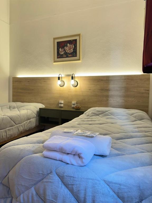 Postel nebo postele na pokoji v ubytování Chrome Hotel