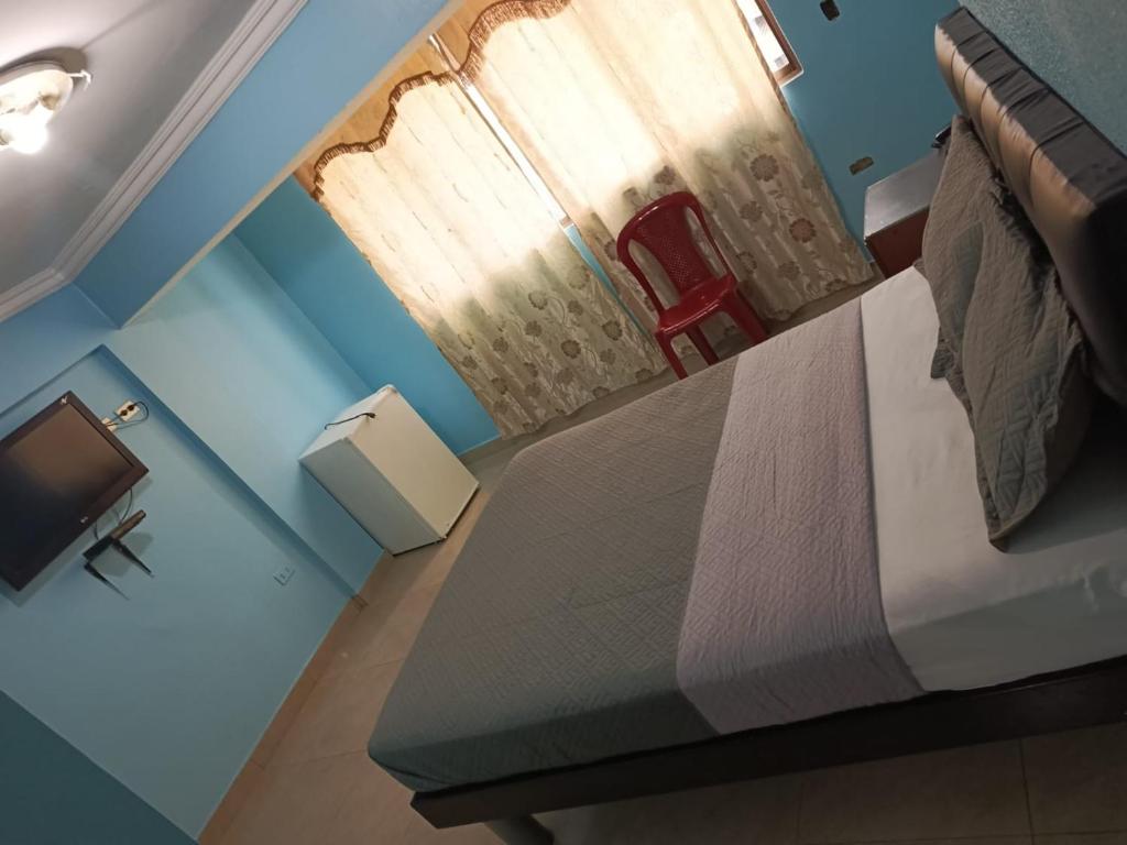 TV a/nebo společenská místnost v ubytování Hotel Caribe