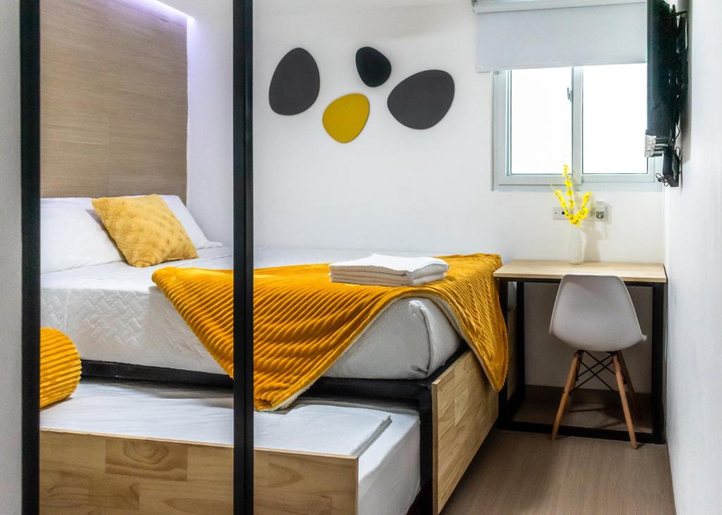Katil atau katil-katil dalam bilik di Modern and Relaxing Near CC Miraflores and Forum Majadas H2
