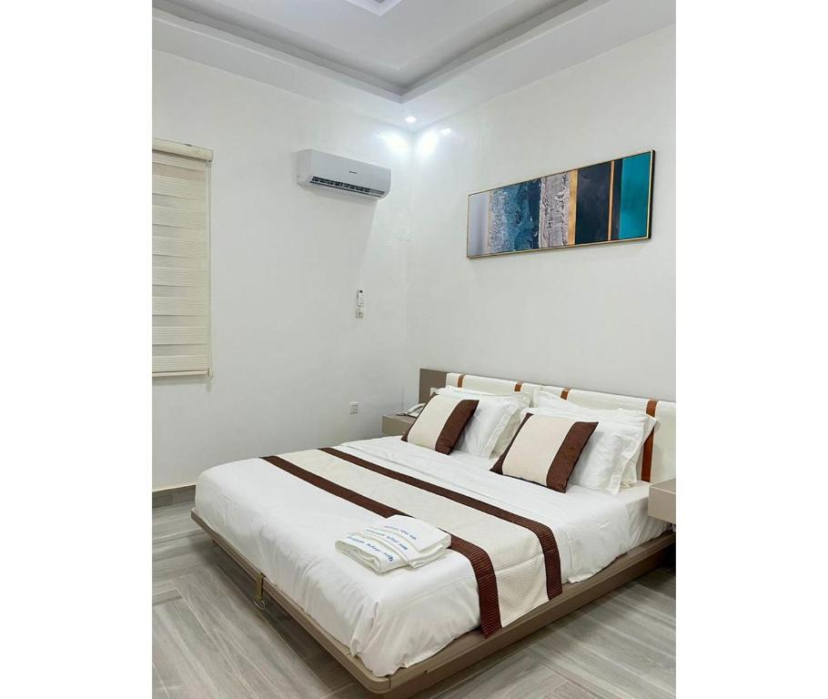 Postel nebo postele na pokoji v ubytování Milennium Hotel Nouadhibou