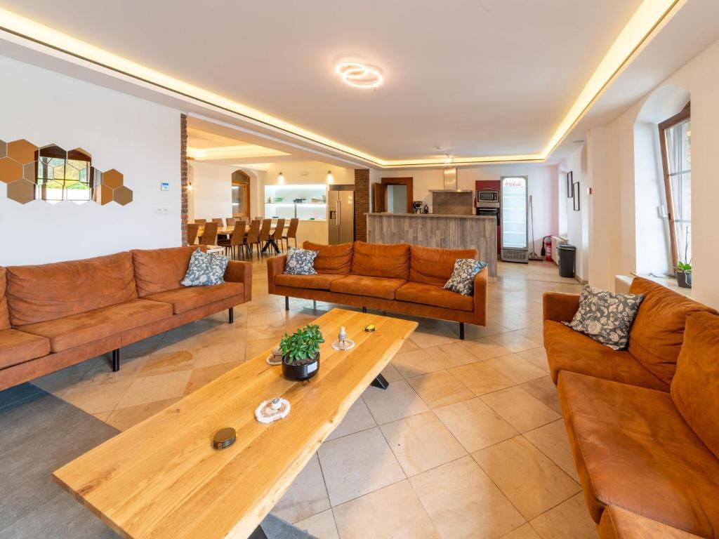 Posezení v ubytování Country House Ardennes with Pool and Sauna