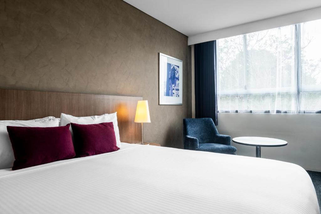 Postel nebo postele na pokoji v ubytování Hotel Urban St Leonards