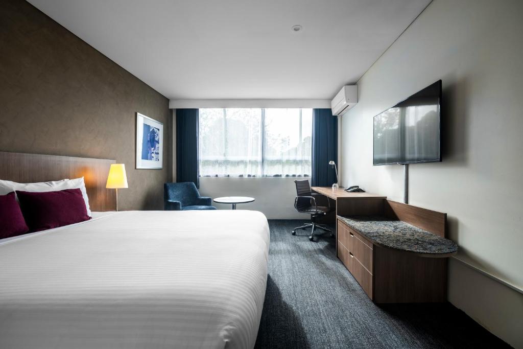 Postel nebo postele na pokoji v ubytování Hotel Urban St Leonards