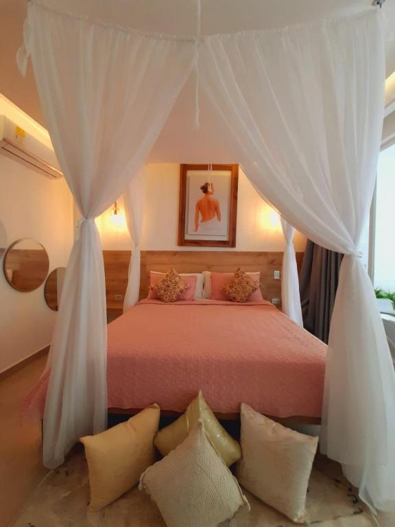 Postel nebo postele na pokoji v ubytování Hotel Monte Bello