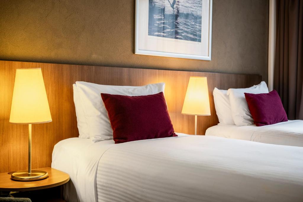 Postel nebo postele na pokoji v ubytování Hotel Urban St Leonards