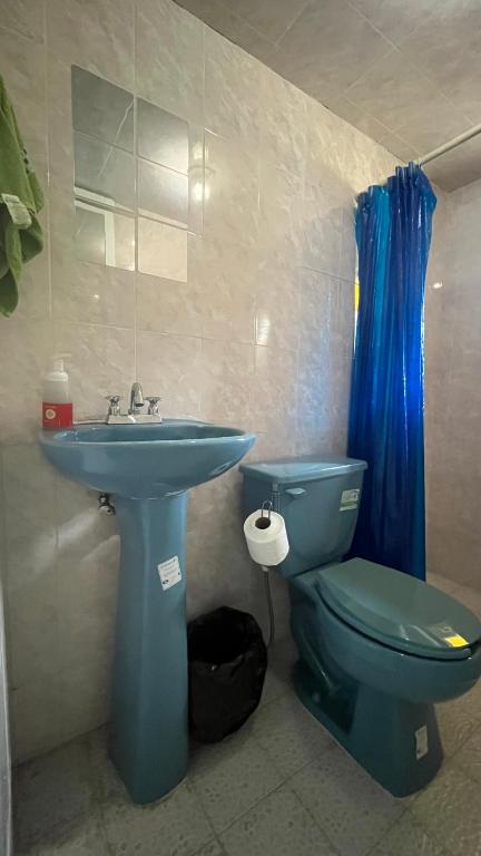 Ένα μπάνιο στο Villa Rooms