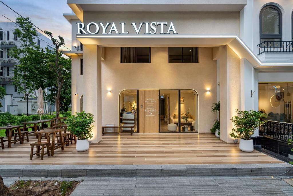 a lobby of a hotel with a restaurant at The Royal Vista - Phu My Hung in Ho Chi Minh City