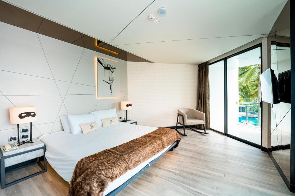 Postel nebo postele na pokoji v ubytování Mera Mare Pattaya