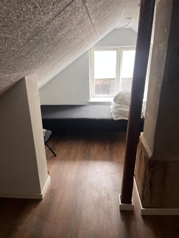Postel nebo postele na pokoji v ubytování Hyggeligt hus