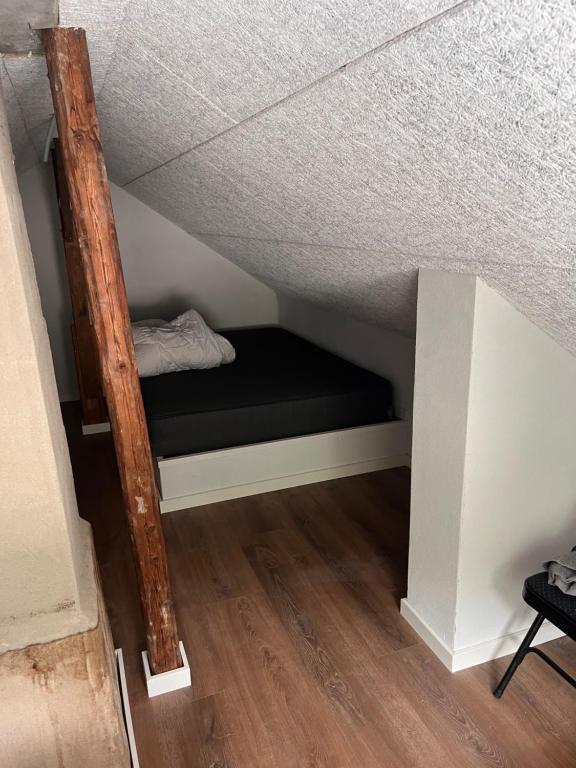 Postel nebo postele na pokoji v ubytování Hyggeligt hus