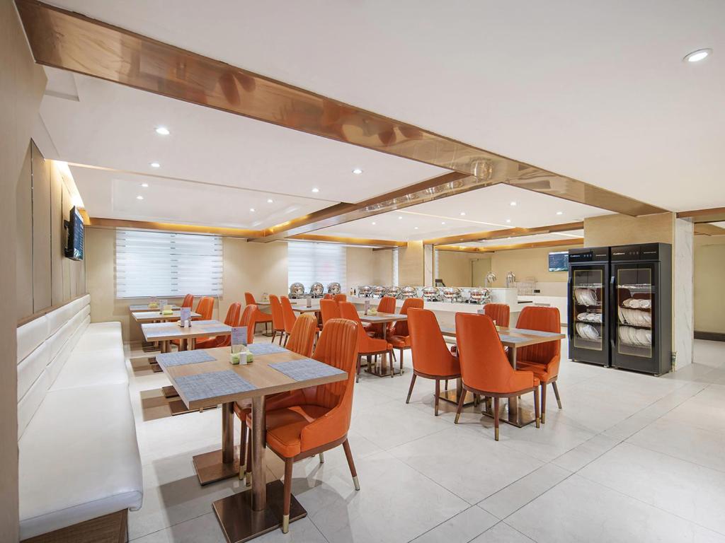 Posezení v ubytování Guangzhou Baiyun Airport Renhe Cornet International Chain Hotel