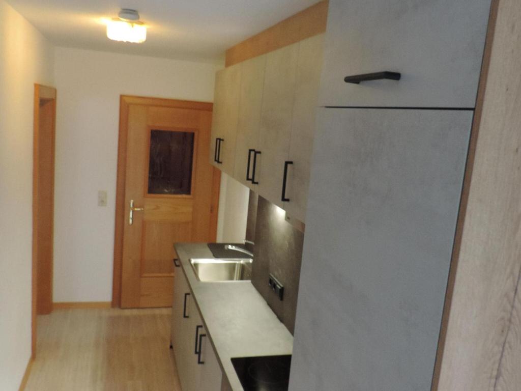A kitchen or kitchenette at Apartment in Ischgl overlooking the mountains